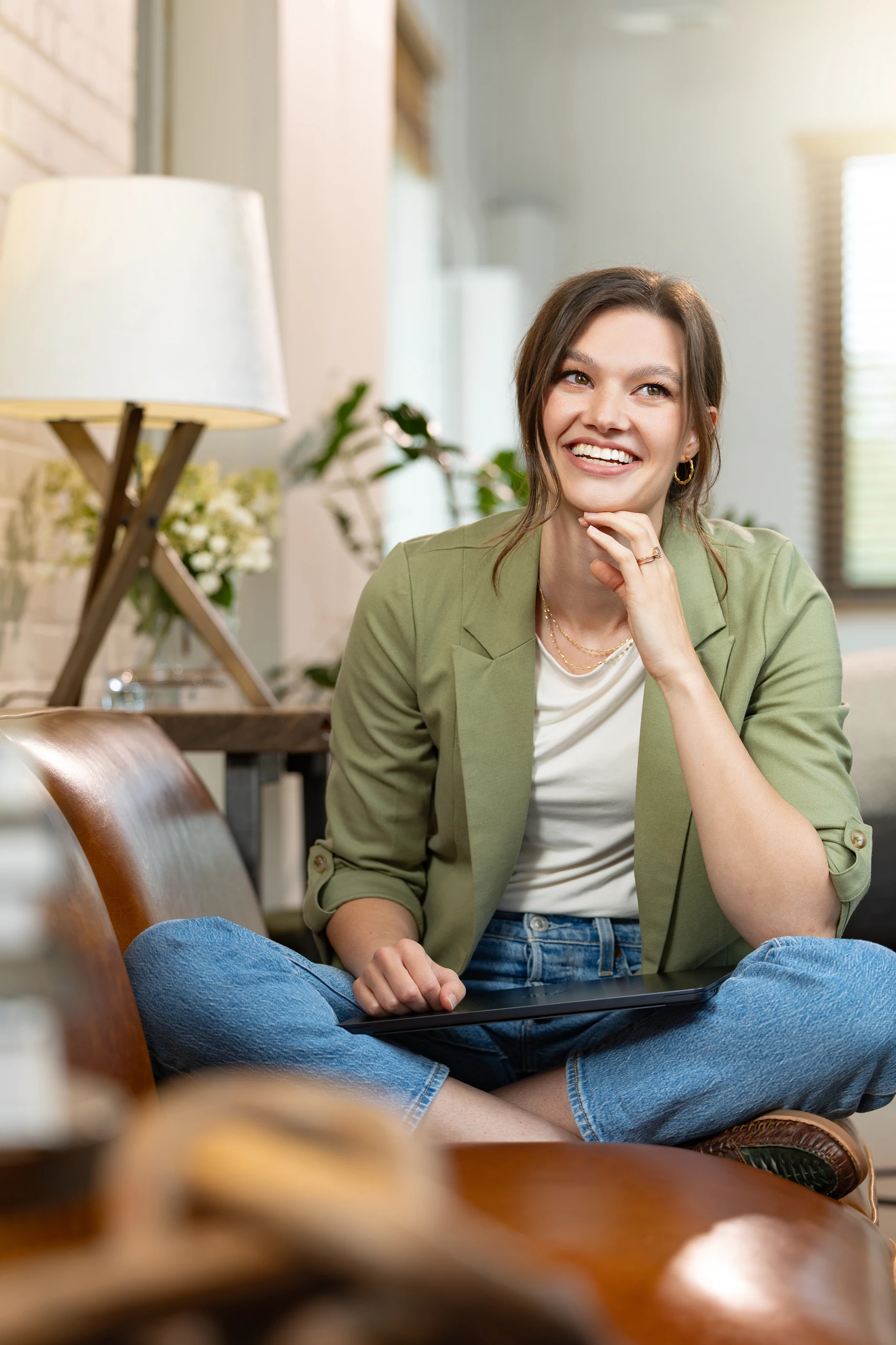 Dr. Rachel Korest seated casually in her office