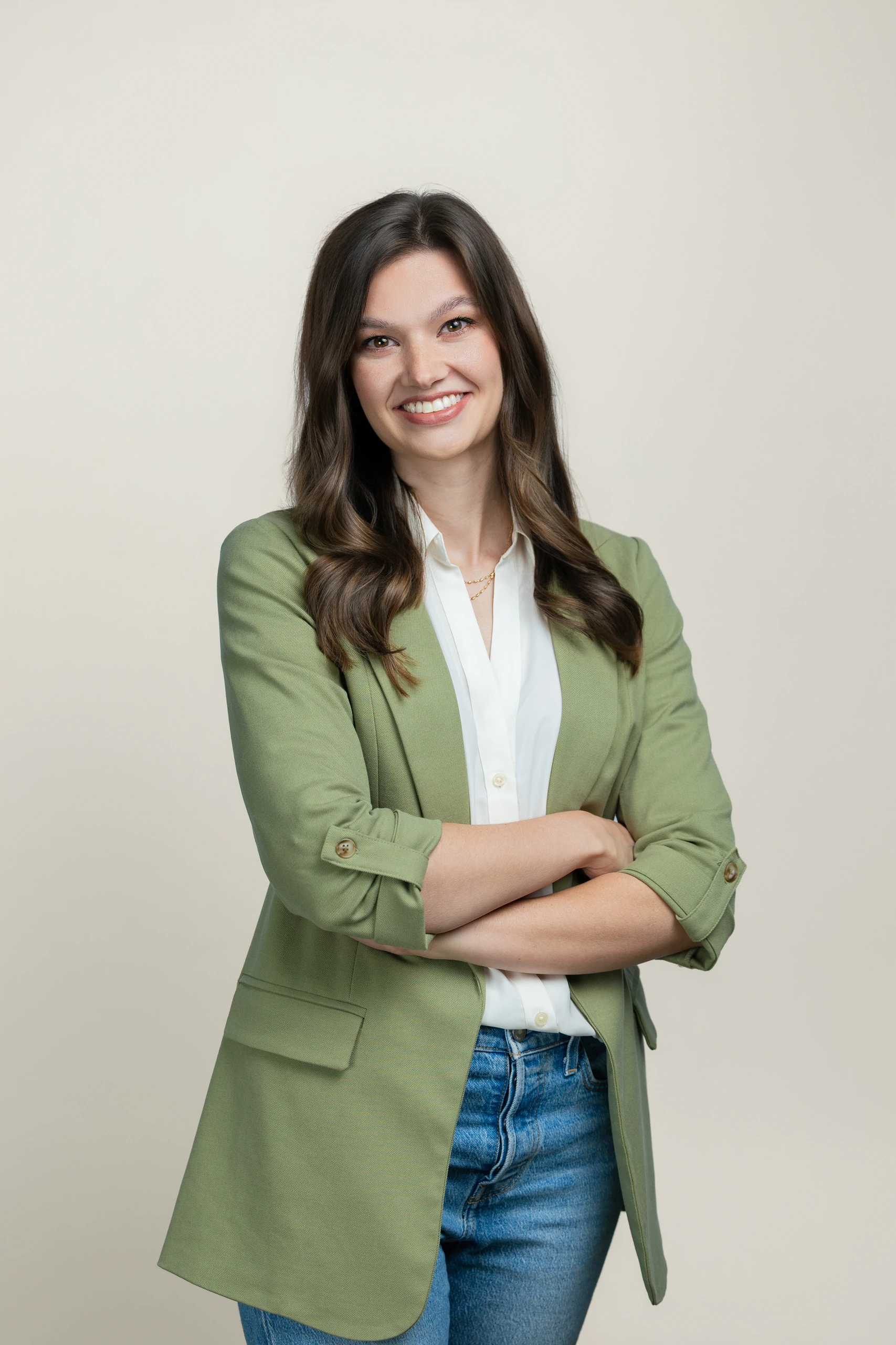 Dr. Rachel Korest in a sage blazer